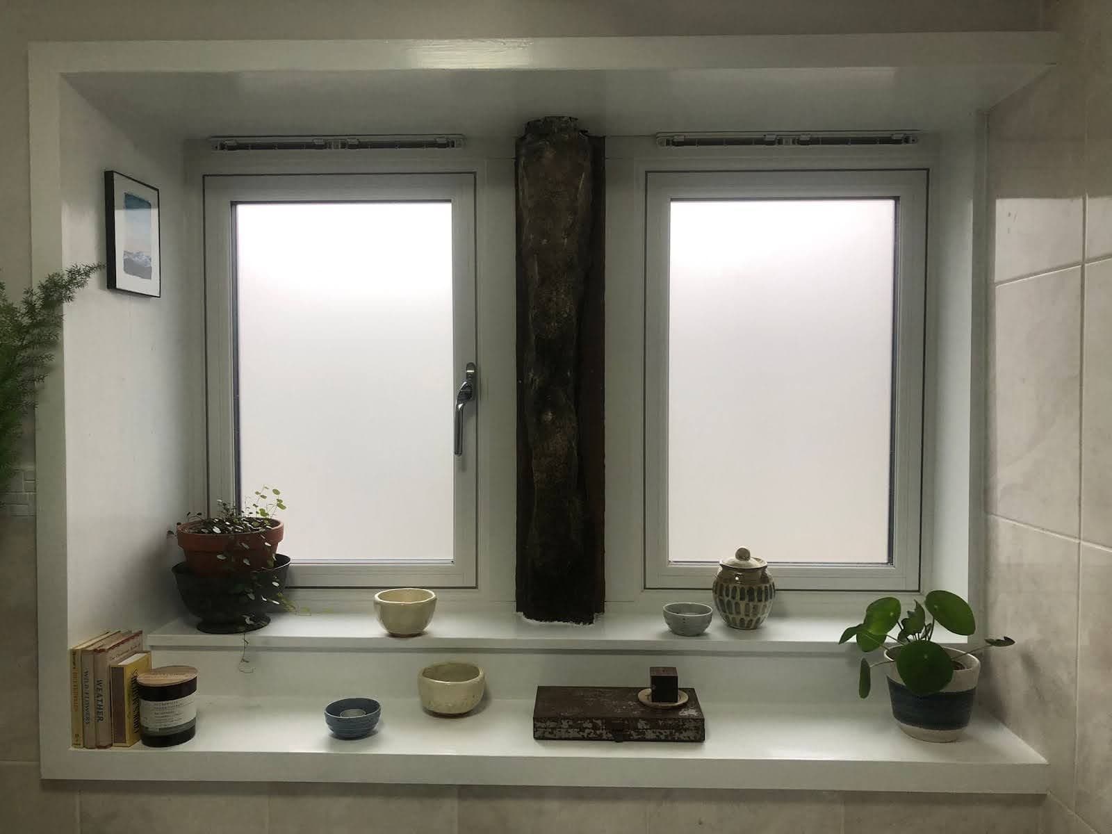 A bespoke window reveal with treated local wood, fitted by Among the Trees